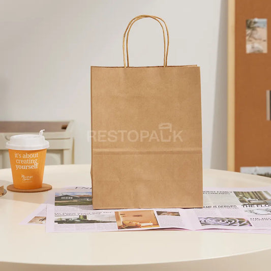 8 1/4" × 4 5/16" × 10 5/8" Tall Brown Kraft Paper Bag with Handles