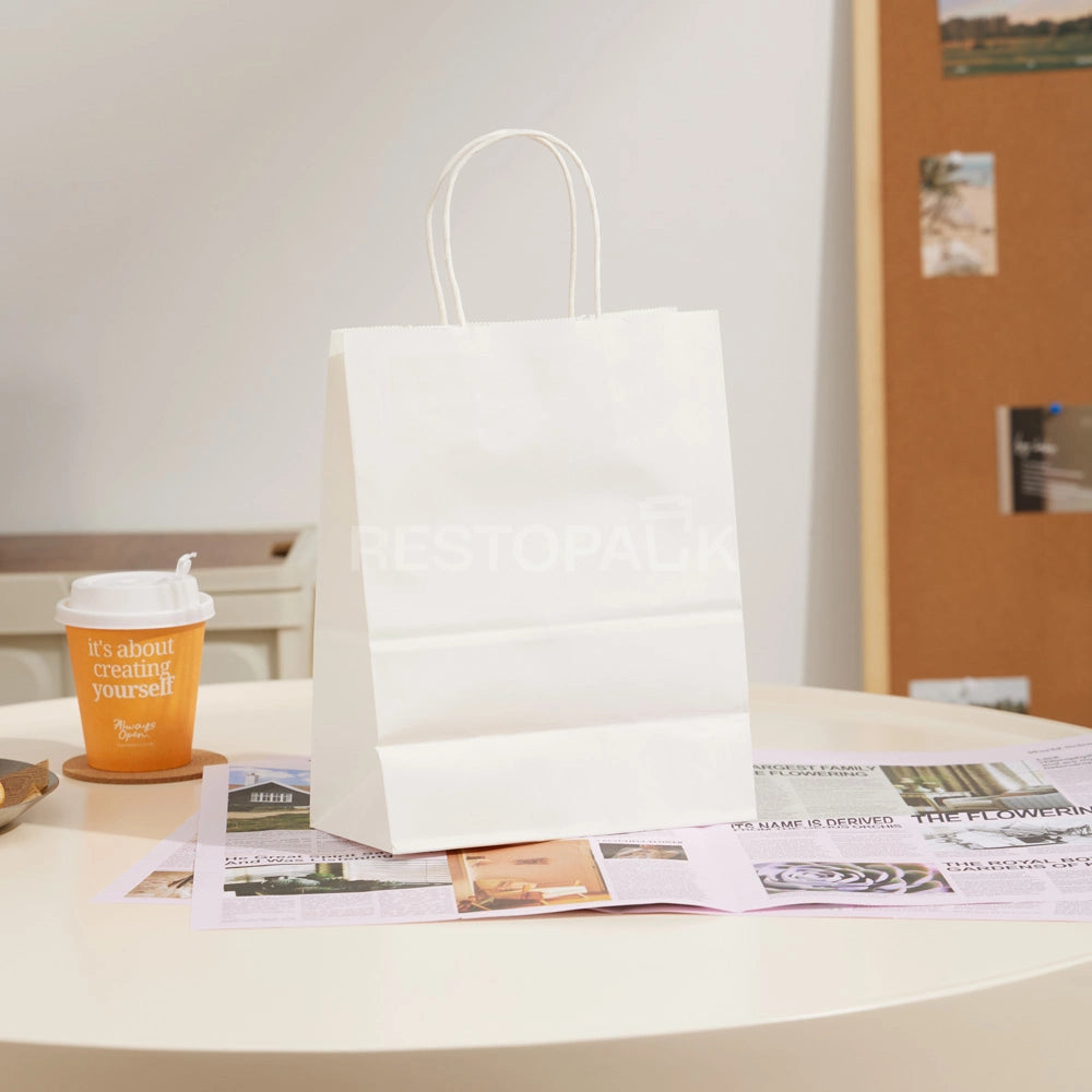 8 1/4" × 4 5/16" × 10 5/8" Tall White Kraft Paper Bag with Handles