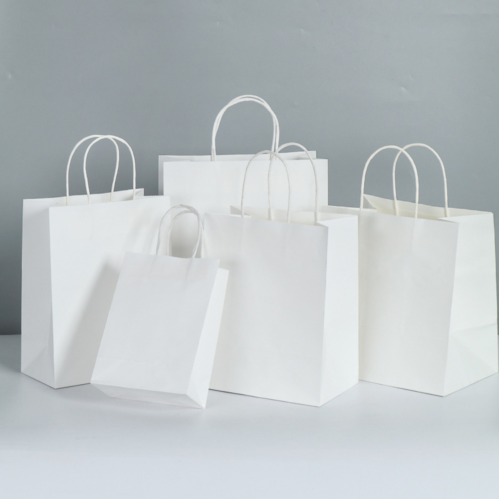 8 1/4" × 4 5/16" × 10 5/8" Tall White Kraft Paper Bag with Handles
