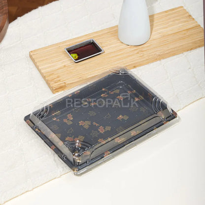 10 1/16" × 7 5/16" Clear Lid Plastic Sushi Trays with Printed Base